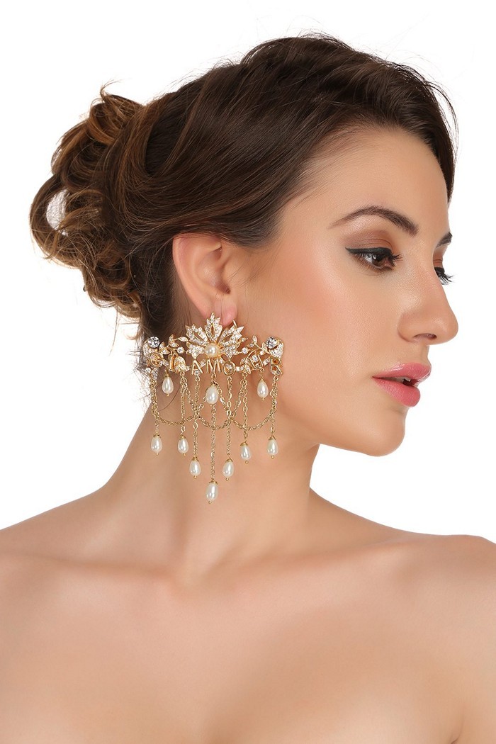 Wearing chandelier earrings - TimesKuwait