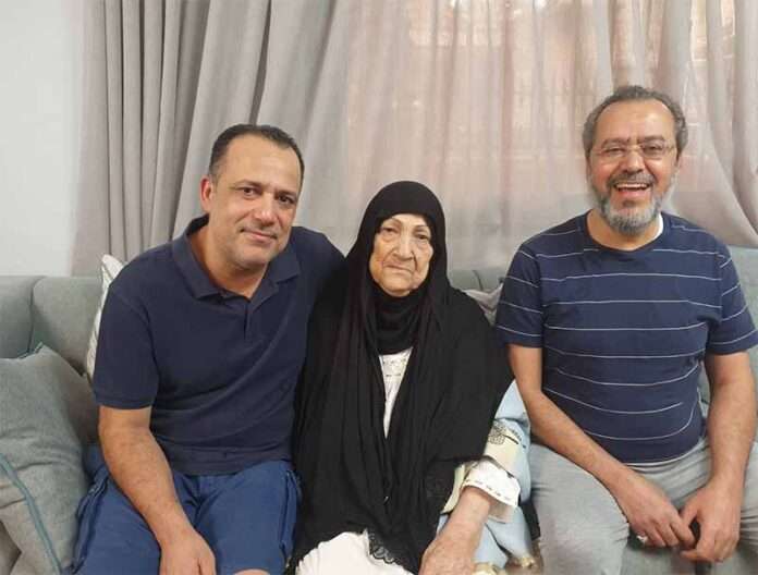 UMM Qassem with her sons